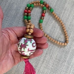Tassel necklace, pink, green, gold.  Hand painted.  Wood beads.  21 inc. No flaw